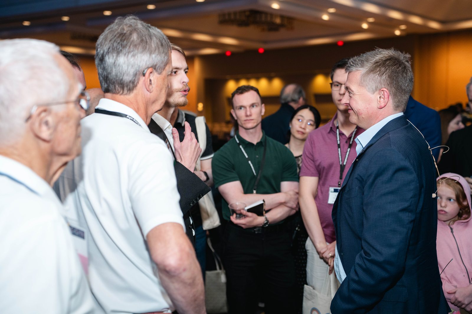 A small group networking at an event